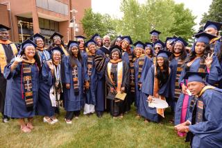 President Anthony L. Jenkins with Graduates