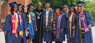 President Jenkins with graduates